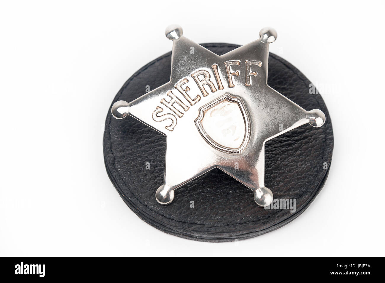 Sheriff's badge isolated on white background Stock Photo - Alamy