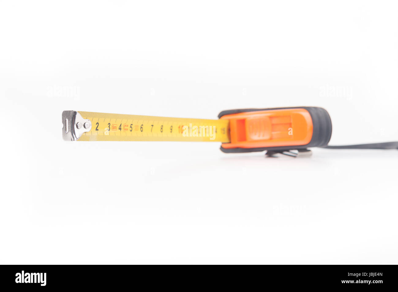 Tape measure isolated on white background Stock Photo - Alamy