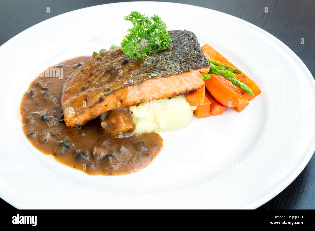 grilled salmon steak with pepper sauce Stock Photo - Alamy