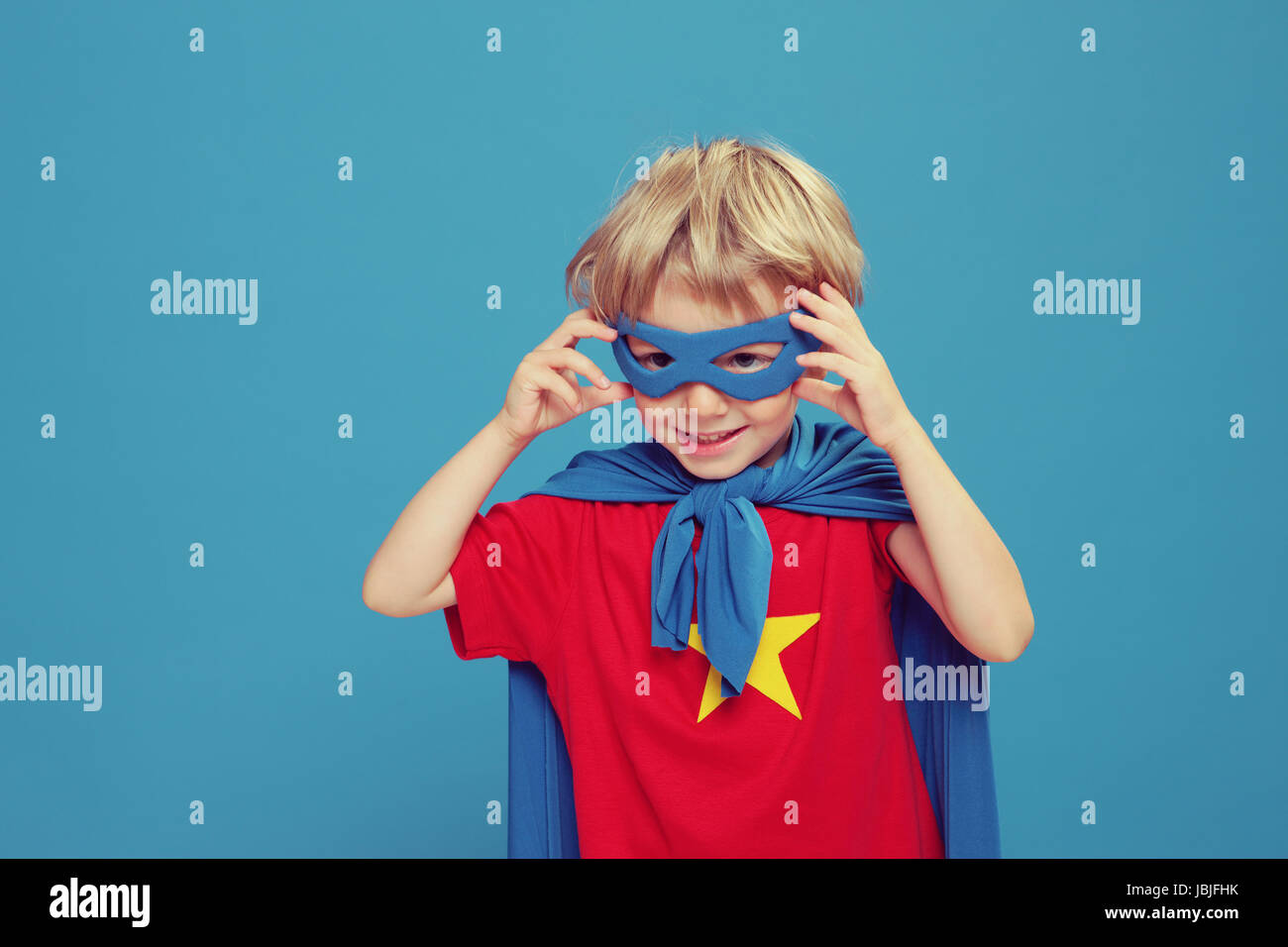 A little superhero ready to save the world Stock Photo - Alamy