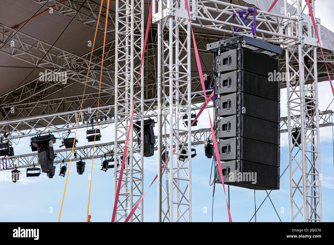 professional sound equipment with spotlights system under roof of ...