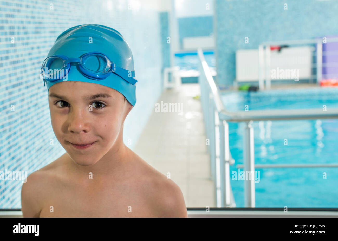 Little boy in swimming pool. Blue swimming pool Stock Photo Alamy