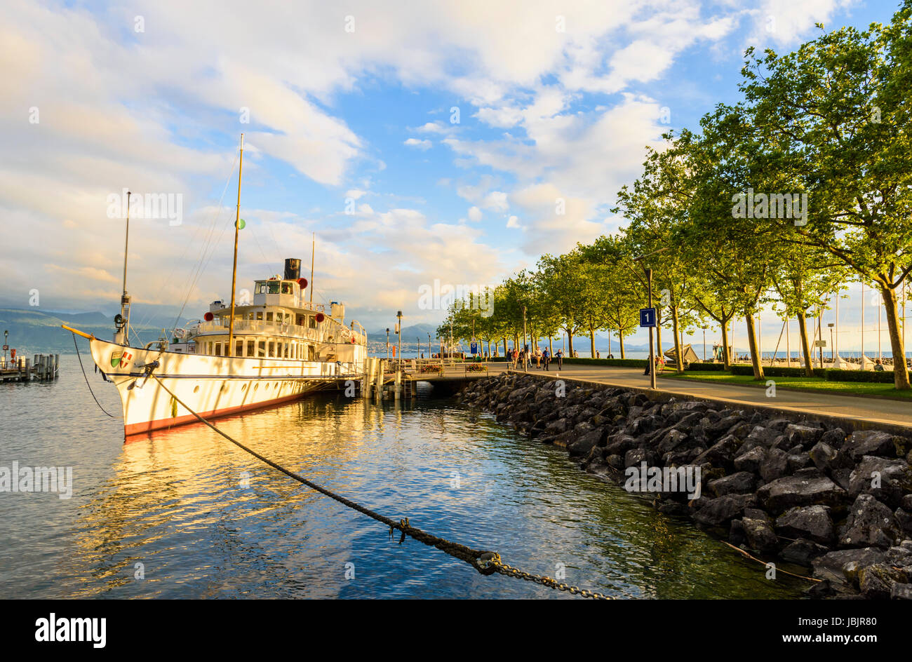 Lausanne waterfront with CGN Rhone, a paddle steamer boat moored in the port of Ouchy, Lausanne, Switzerland Stock Photo