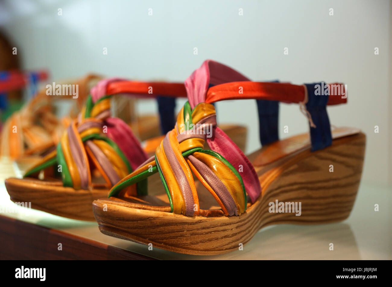 leather clogs with strap