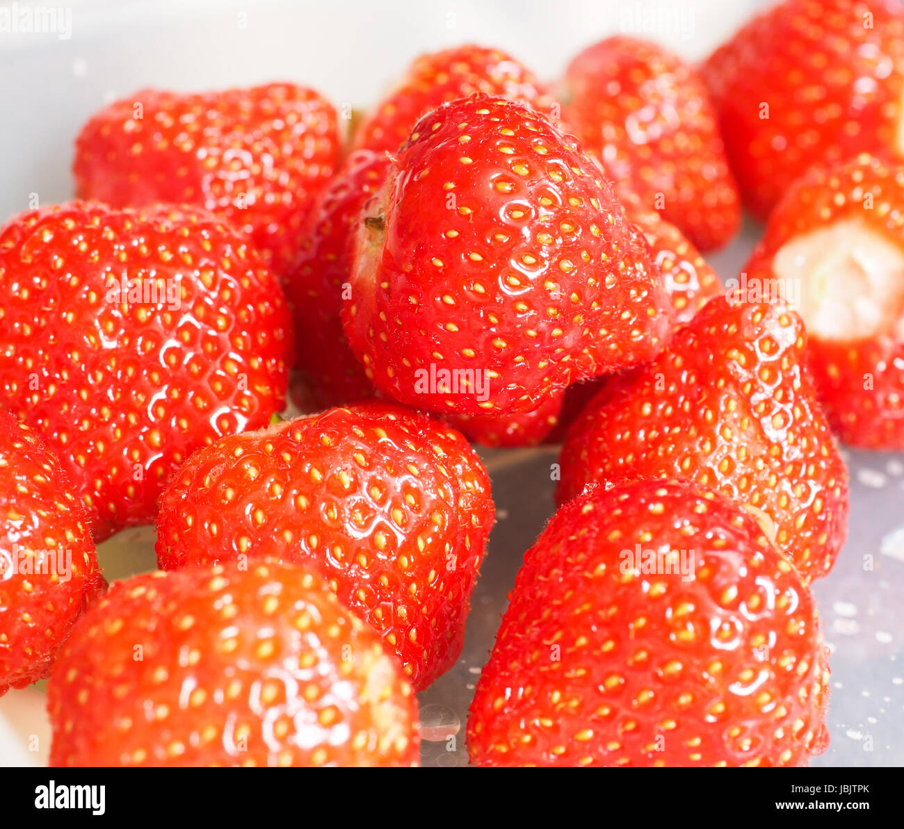 Pile of whole fresh red strawberries without green grass Stock Photo ...