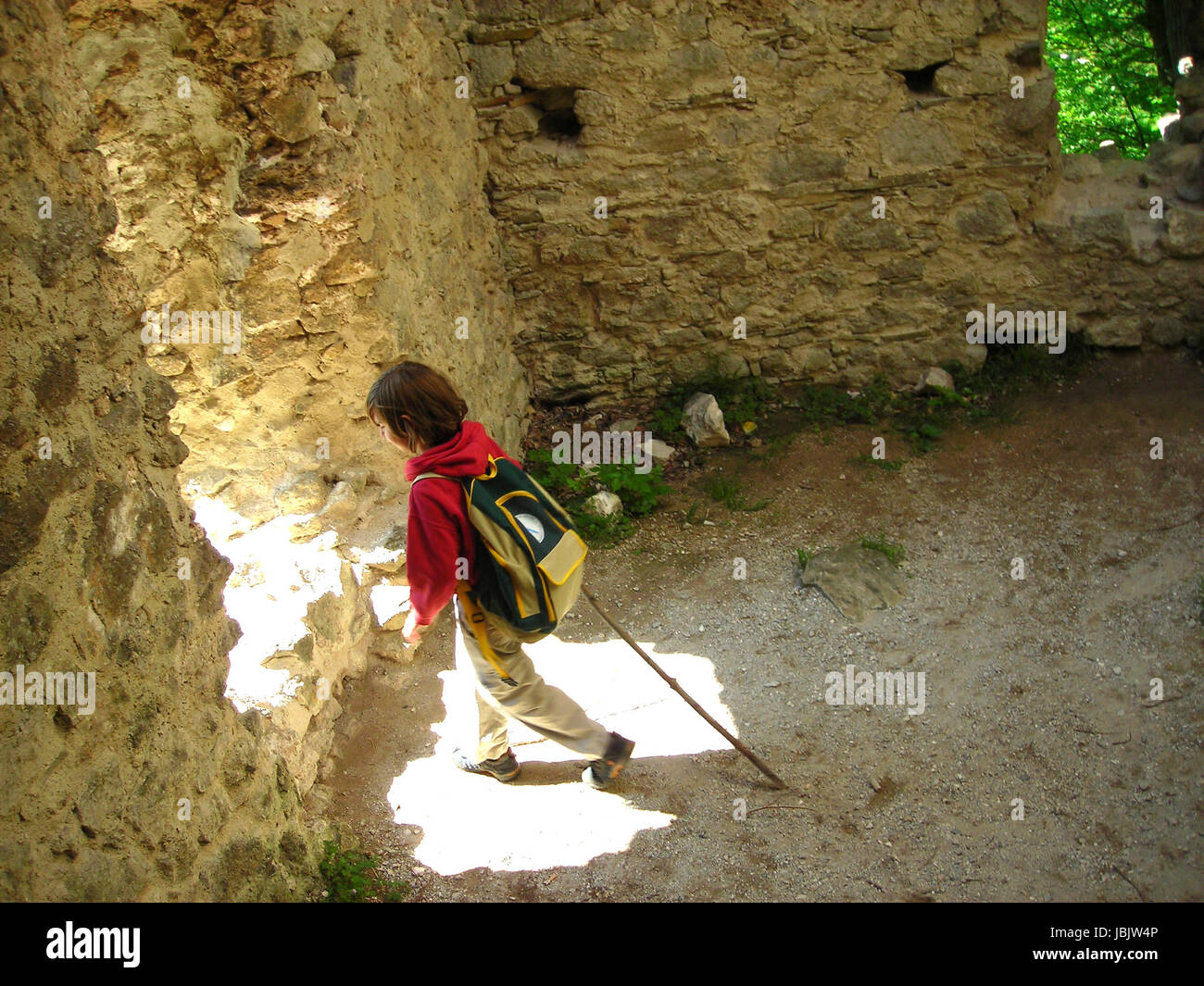a boy in a ruin Stock Photo