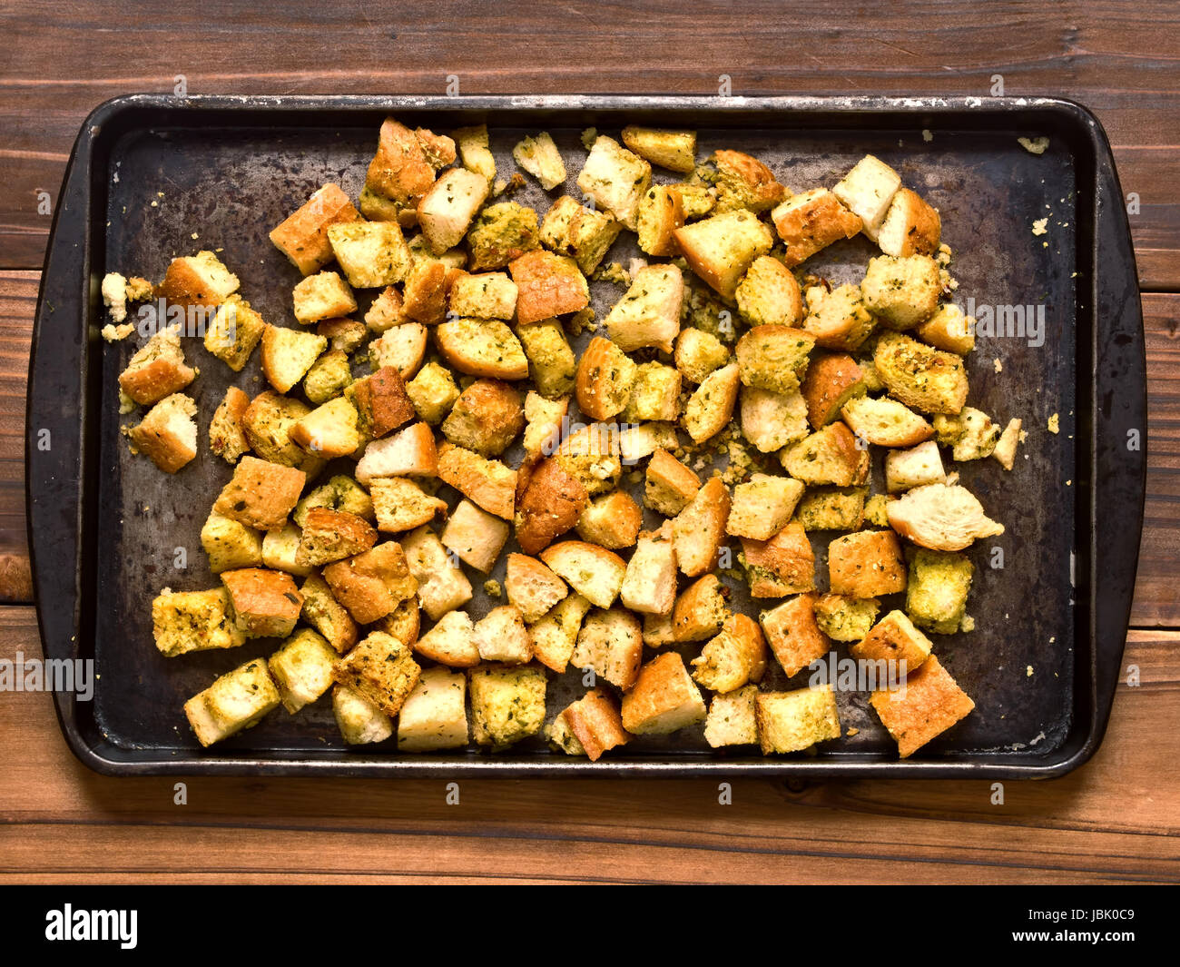 close up of a tray of rustic homemade baked croutons Stock Photo