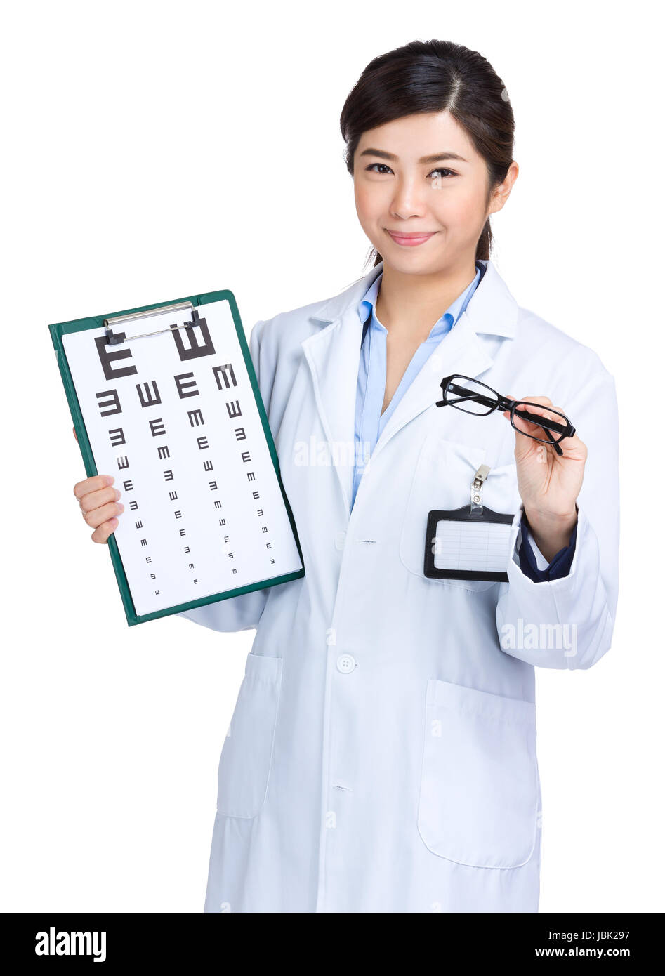 Female oculist holding eyechart and glasses Stock Photo