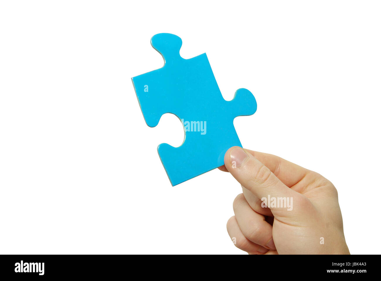 puzzle in hand isolated on white background Stock Photo - Alamy