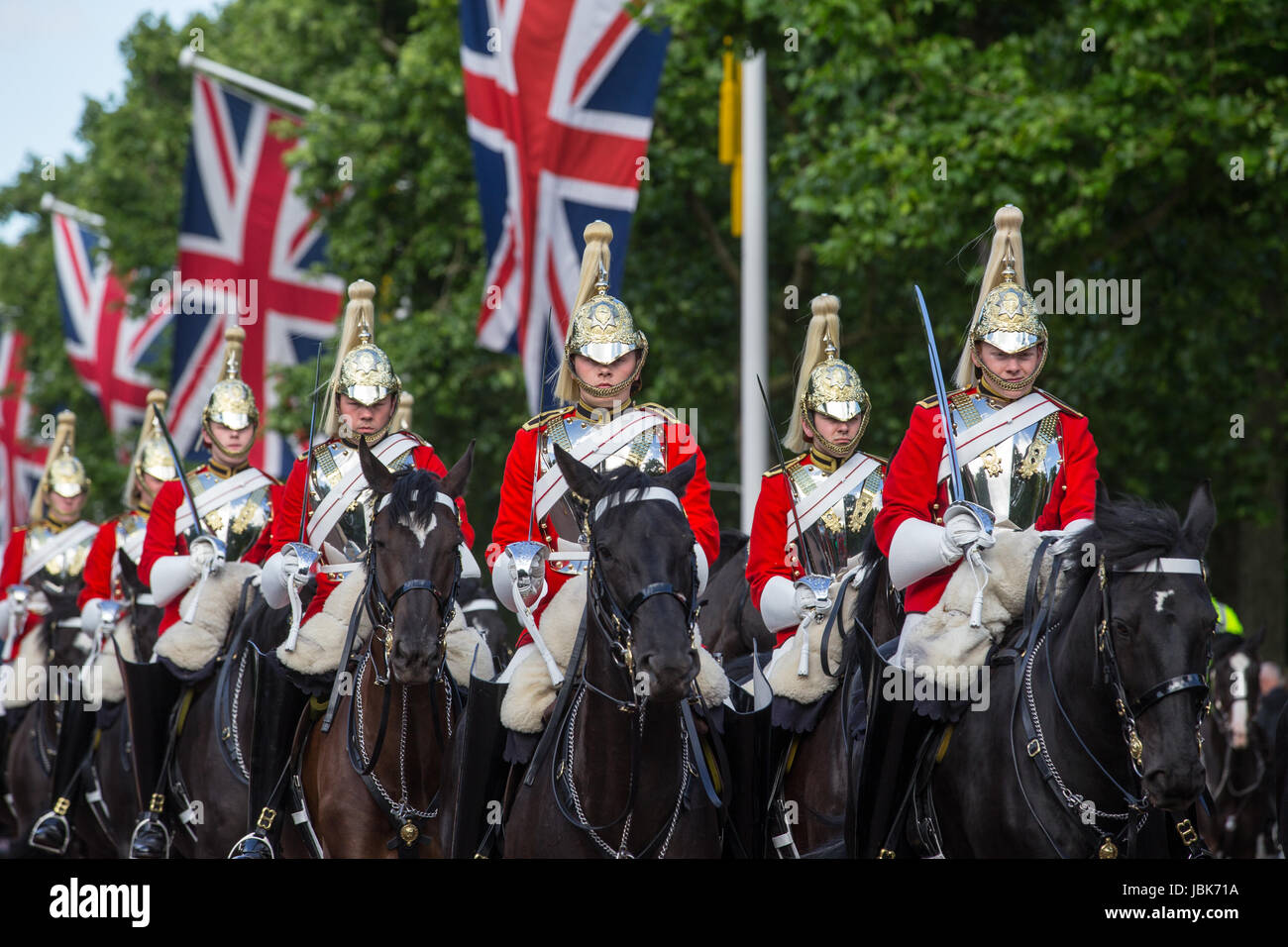 Household cavalry parade along The Mall, London Stock Photo