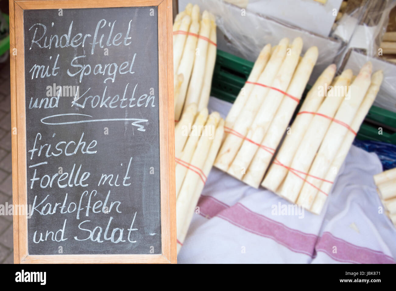 Fresh Asparagus with german menu board Stock Photo Alamy