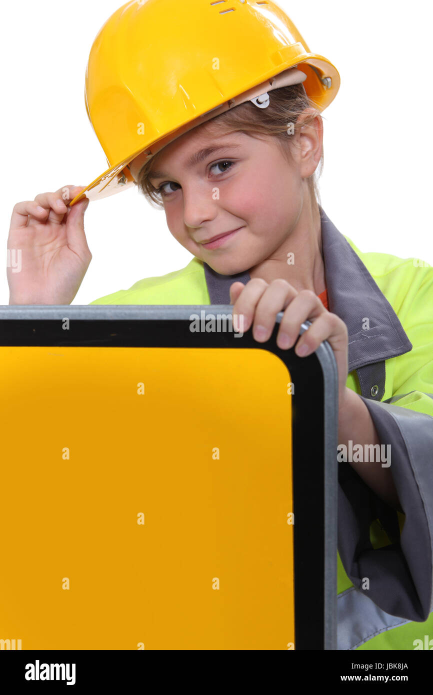 Girl with yellow helmet Stock Photo - Alamy