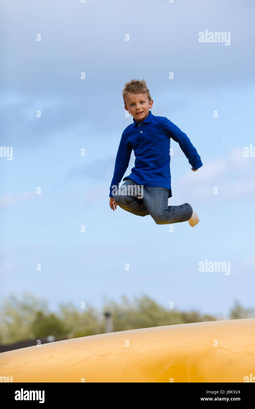 Kids jumping up and down hires stock photography and images Alamy
