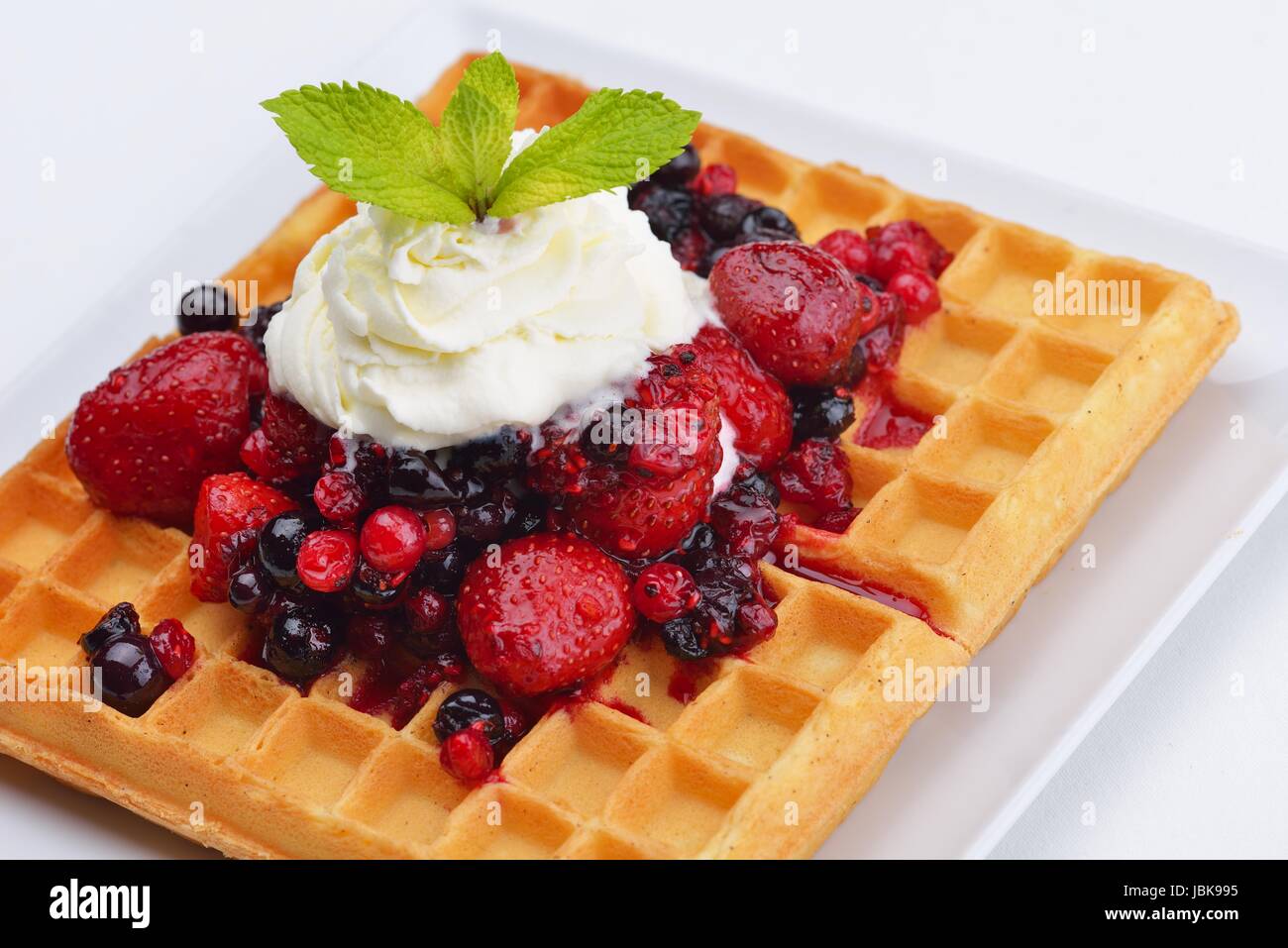 a selection of three italian gelato icecream scoops topped with nuts