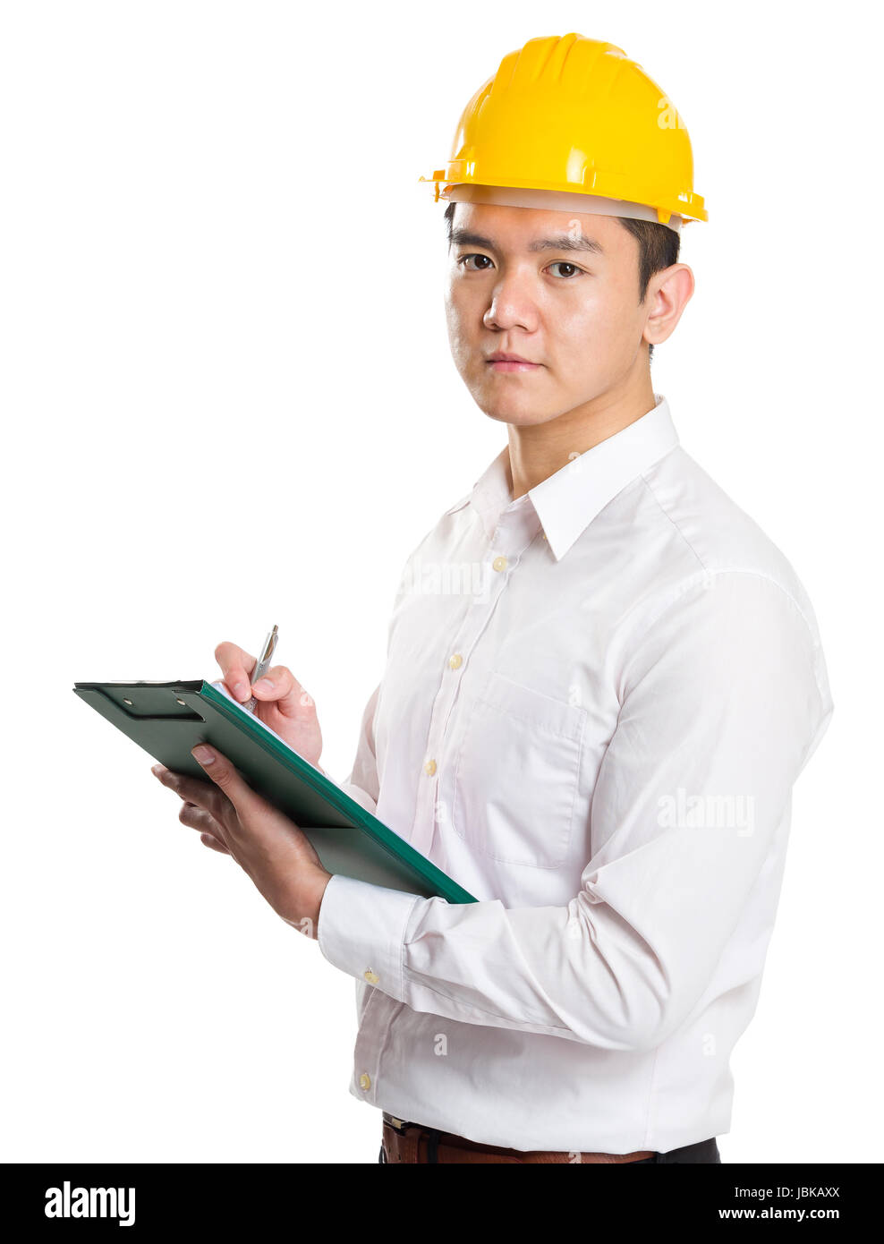 Young businessman architect writing on clipboard Stock Photo - Alamy