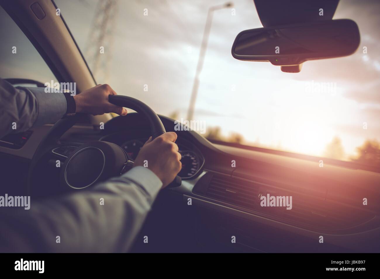 Car Traveling For Business Concept Photo. Businessman Behind the Wheel ...