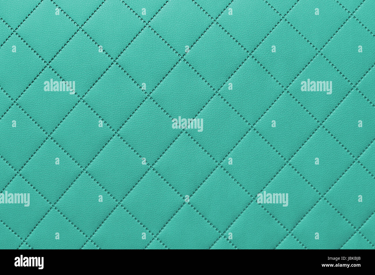 detail of sewn leather, turquoise leather upholstery background pattern Stock Photo