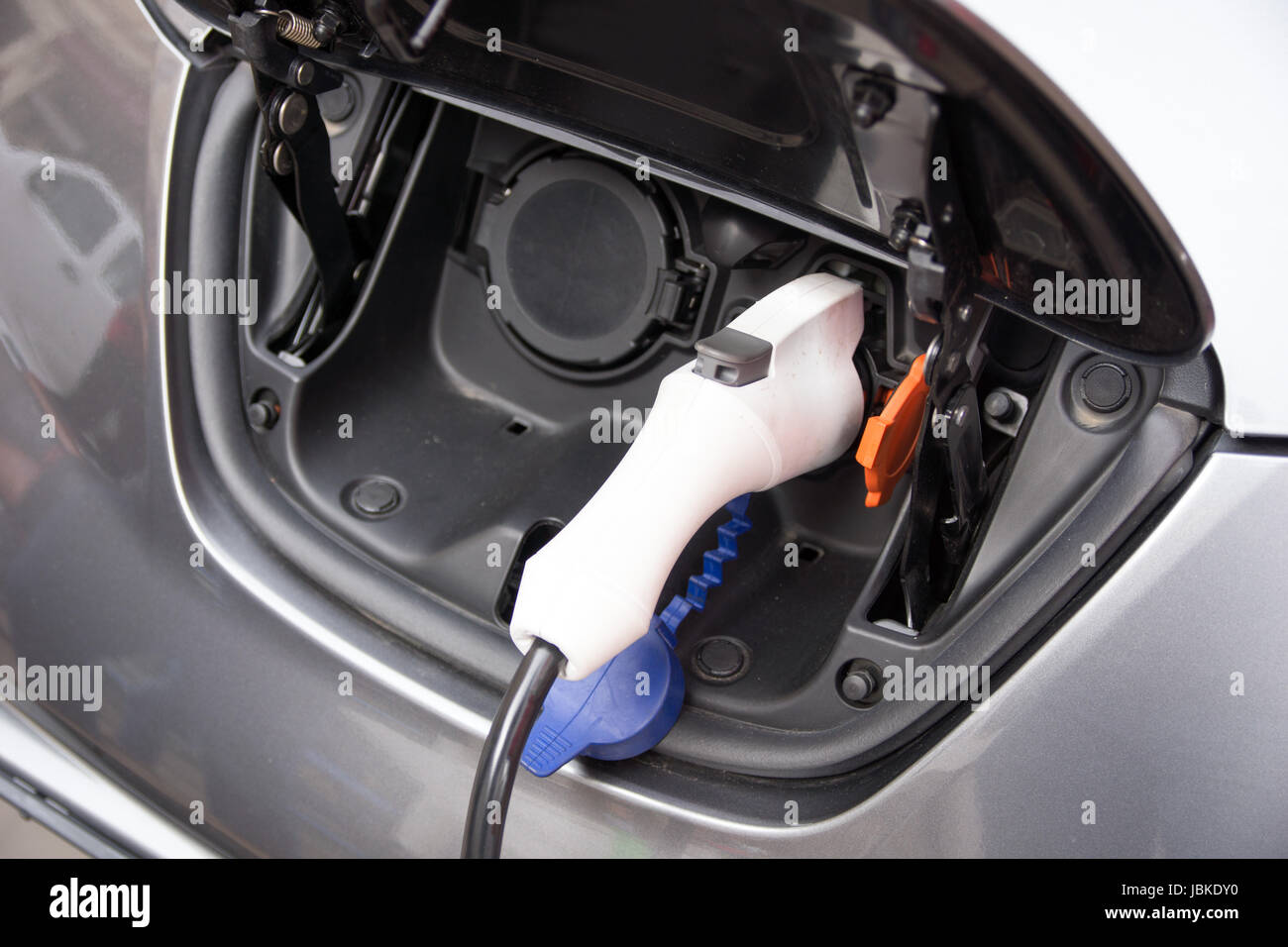 Recharging an electric car Stock Photo
