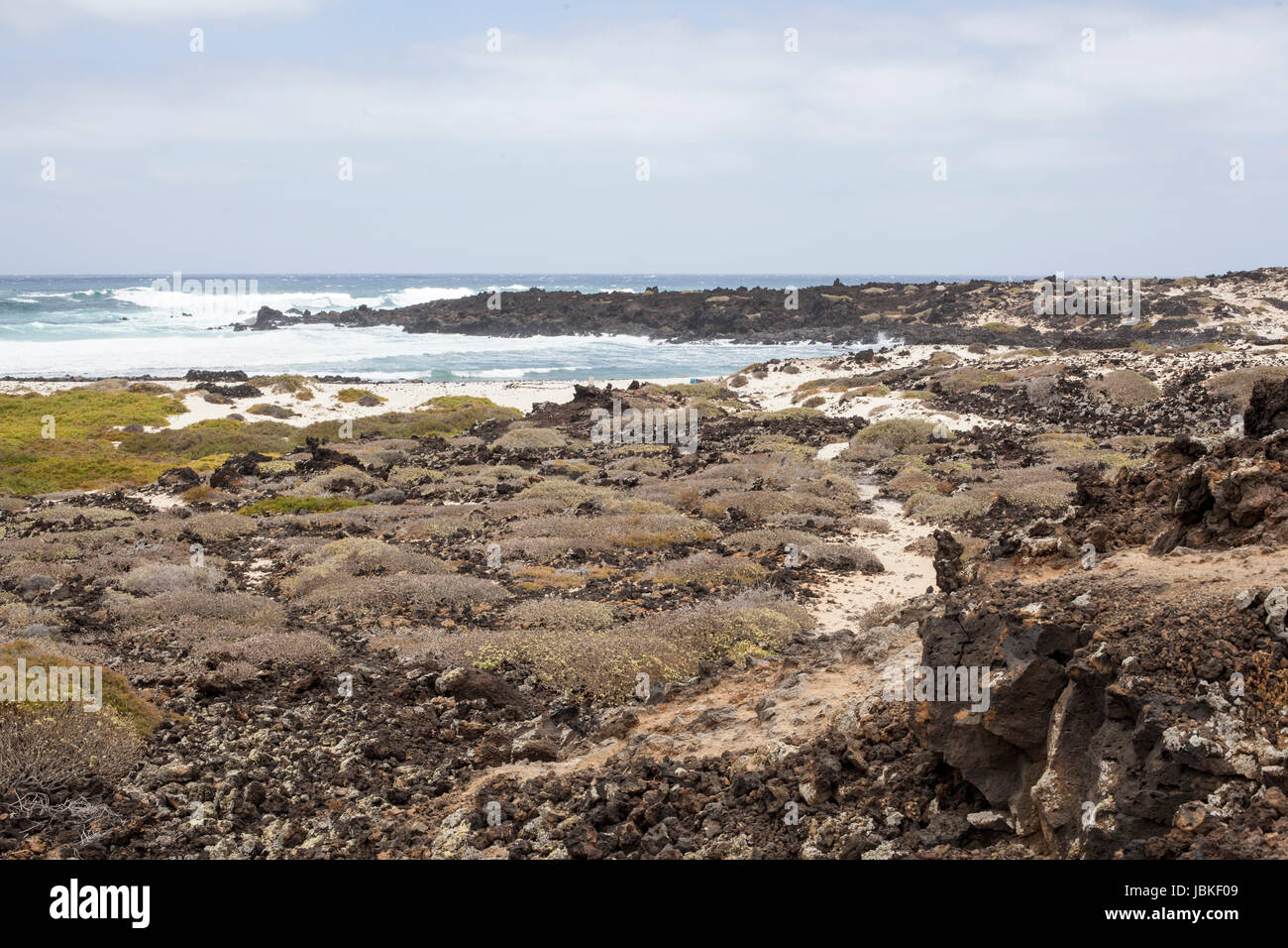 Lava by the sea in Lanzarote Stock Photo