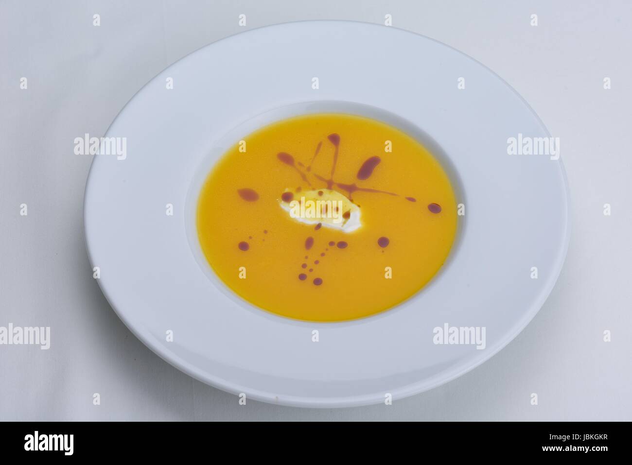 vegetable cream soup closeup isolated on white background Stock Photo ...