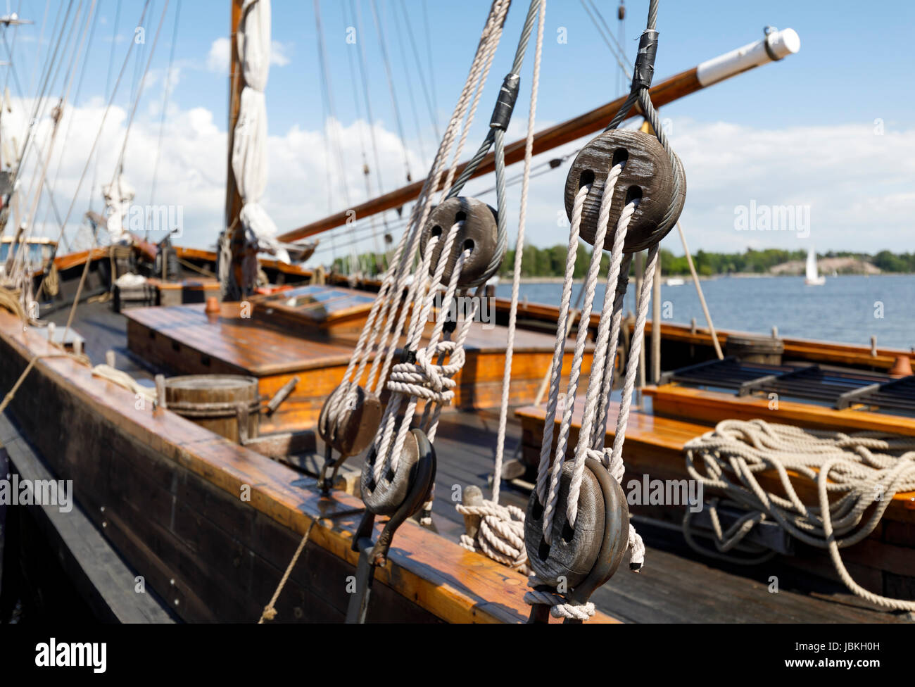 Ancient wooden sailboat pulleys and ropes detail Stock Photo