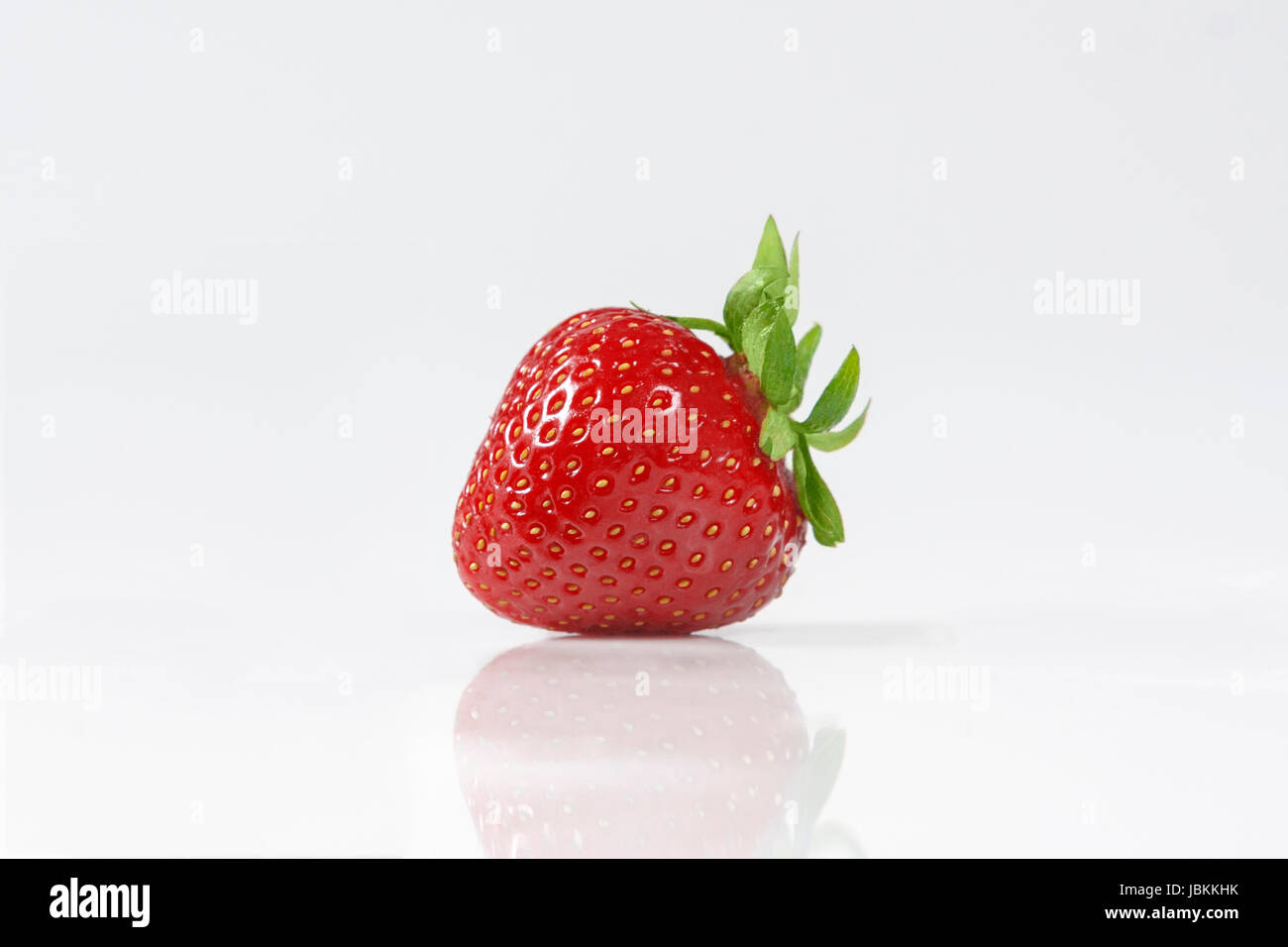 Red strawberry isolated on white background Stock Photo - Alamy