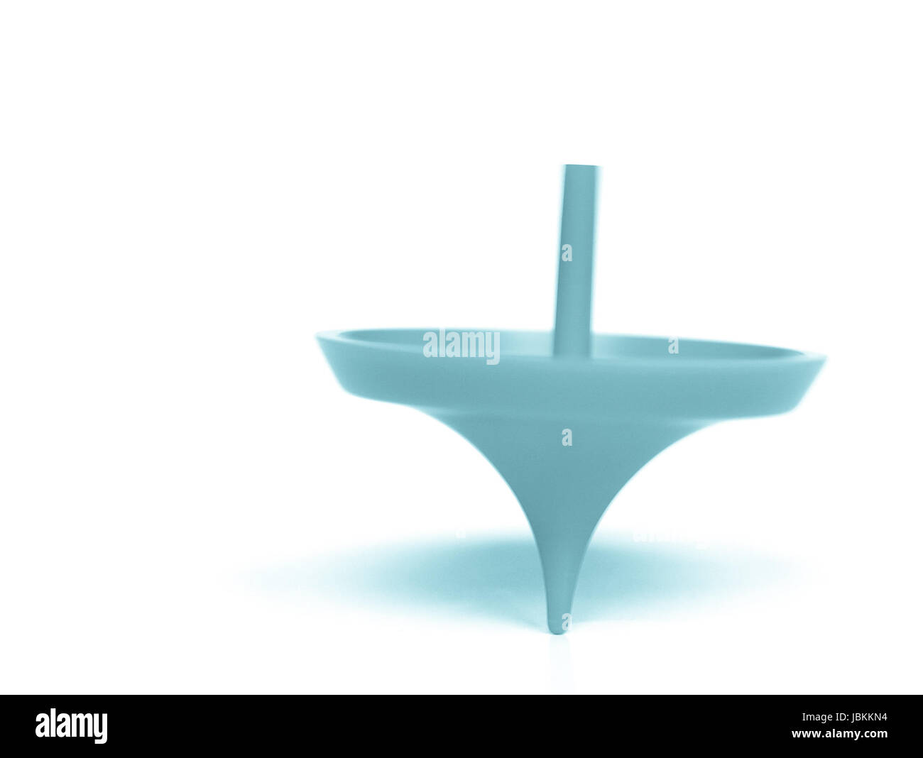 Spinning top with motion blur showing rotation cool cyanotype Stock