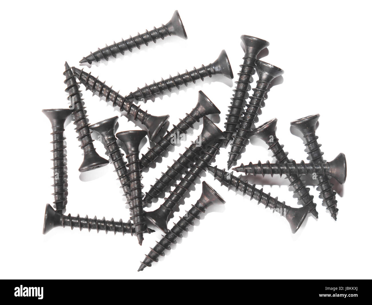 A group of many screws used as fasteners over white background Stock