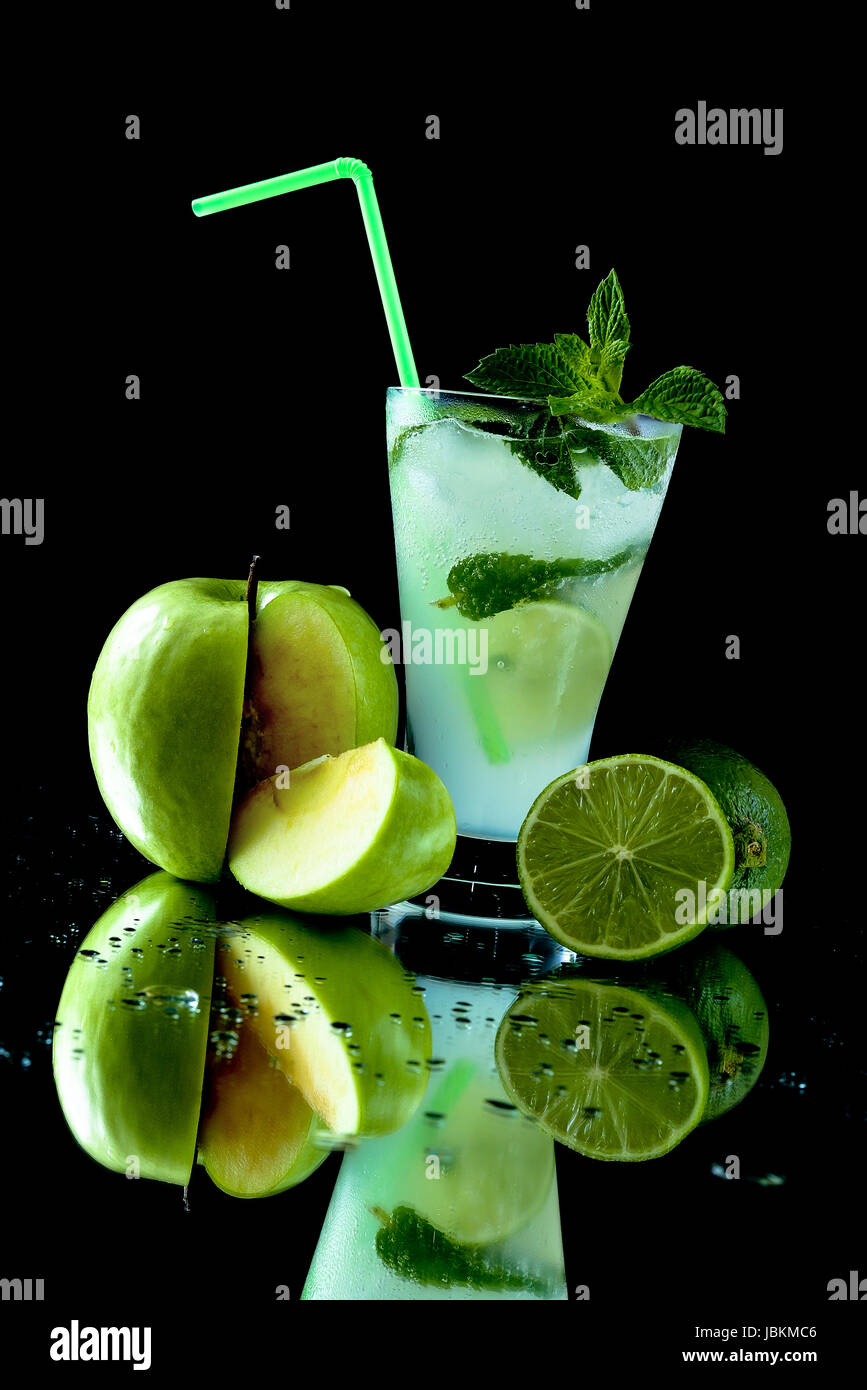 Mojito cocktail with green apple and line on a black background Stock Photo
