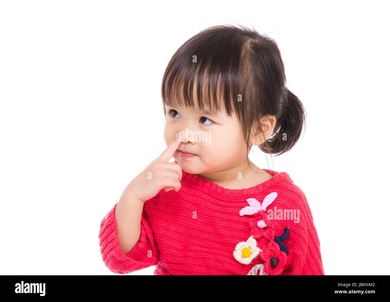 Asia little girl touch her nose Stock Photo Alamy