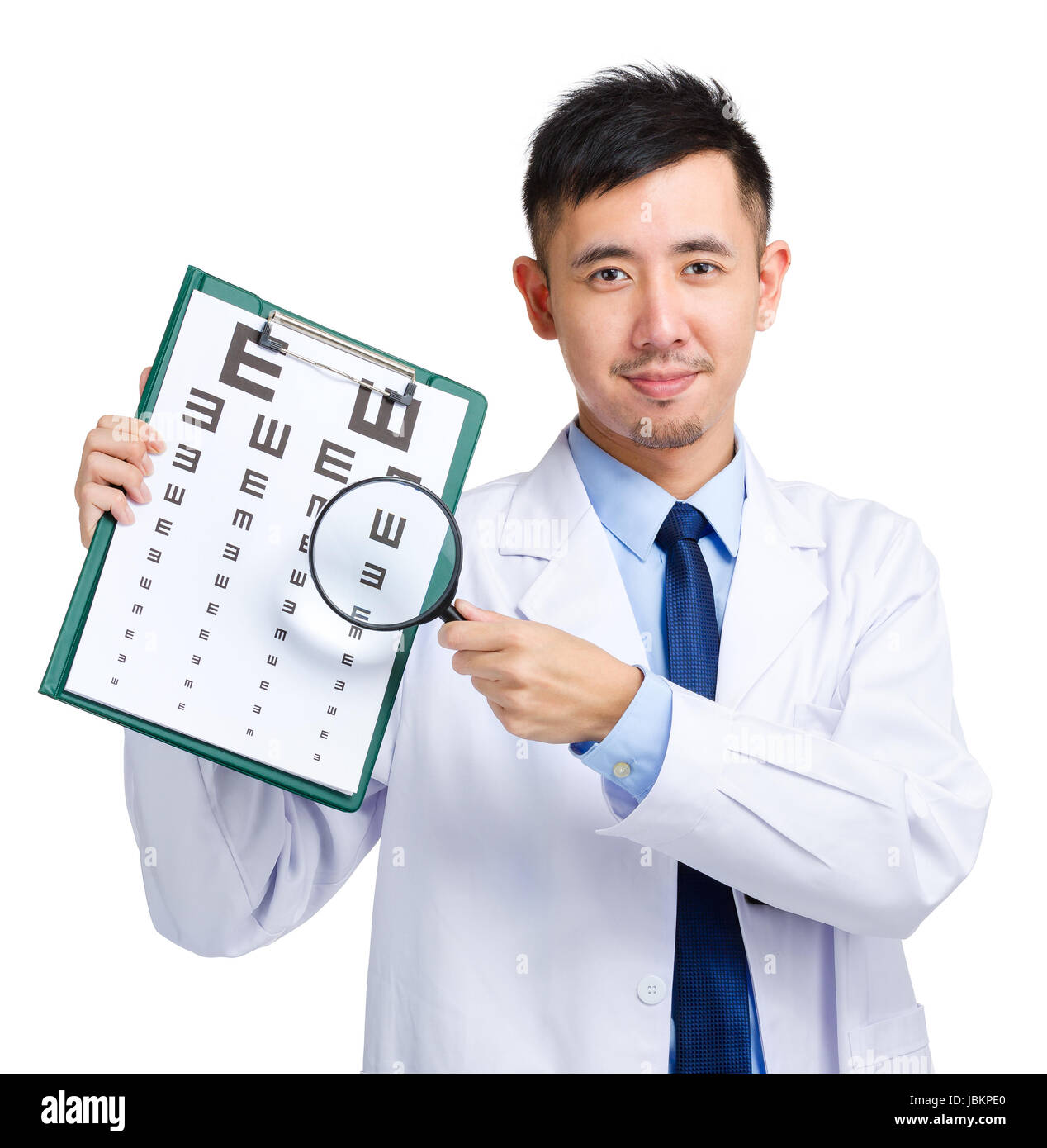 Male doctor holding optometry chart and magnifying glass Stock Photo