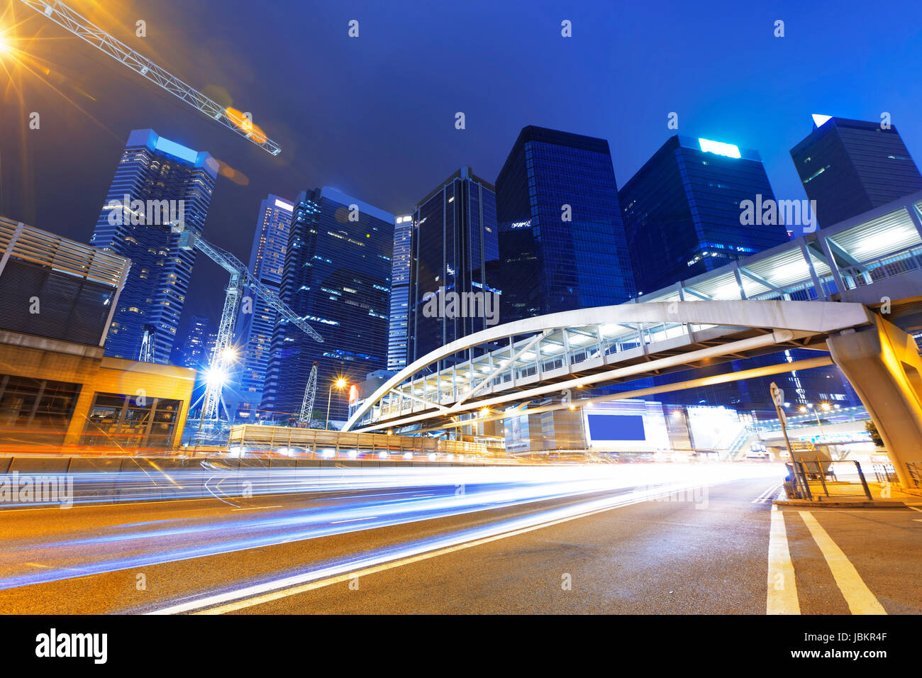 Busy traffic in Hong Kong modern city at night Stock Photo - Alamy