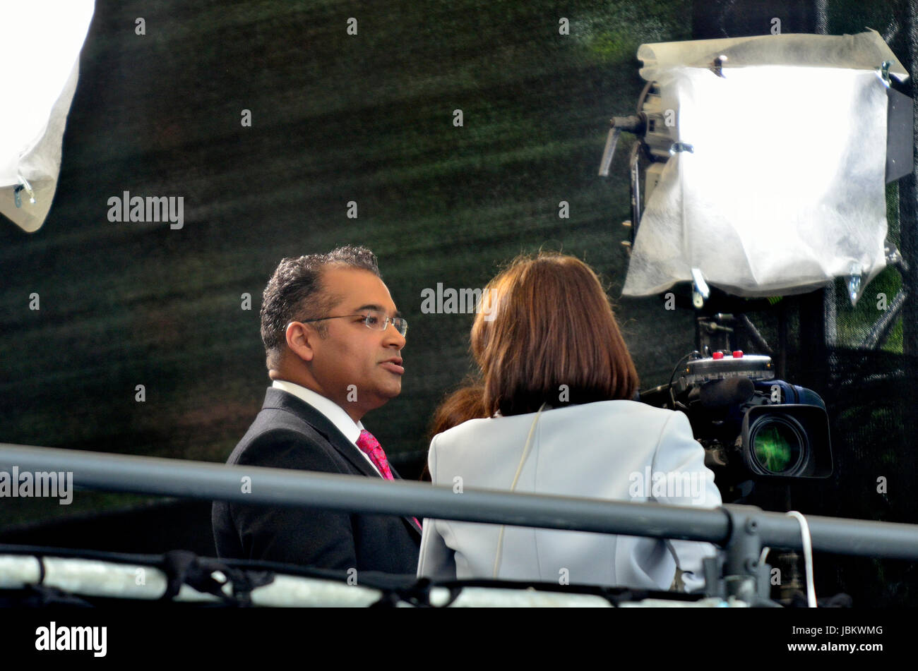 Krishnan Guru-Murthy, Channel 4 news journalist and presenter, on College Green, Westminster, 9th June 2017, the day after the general election Stock Photo