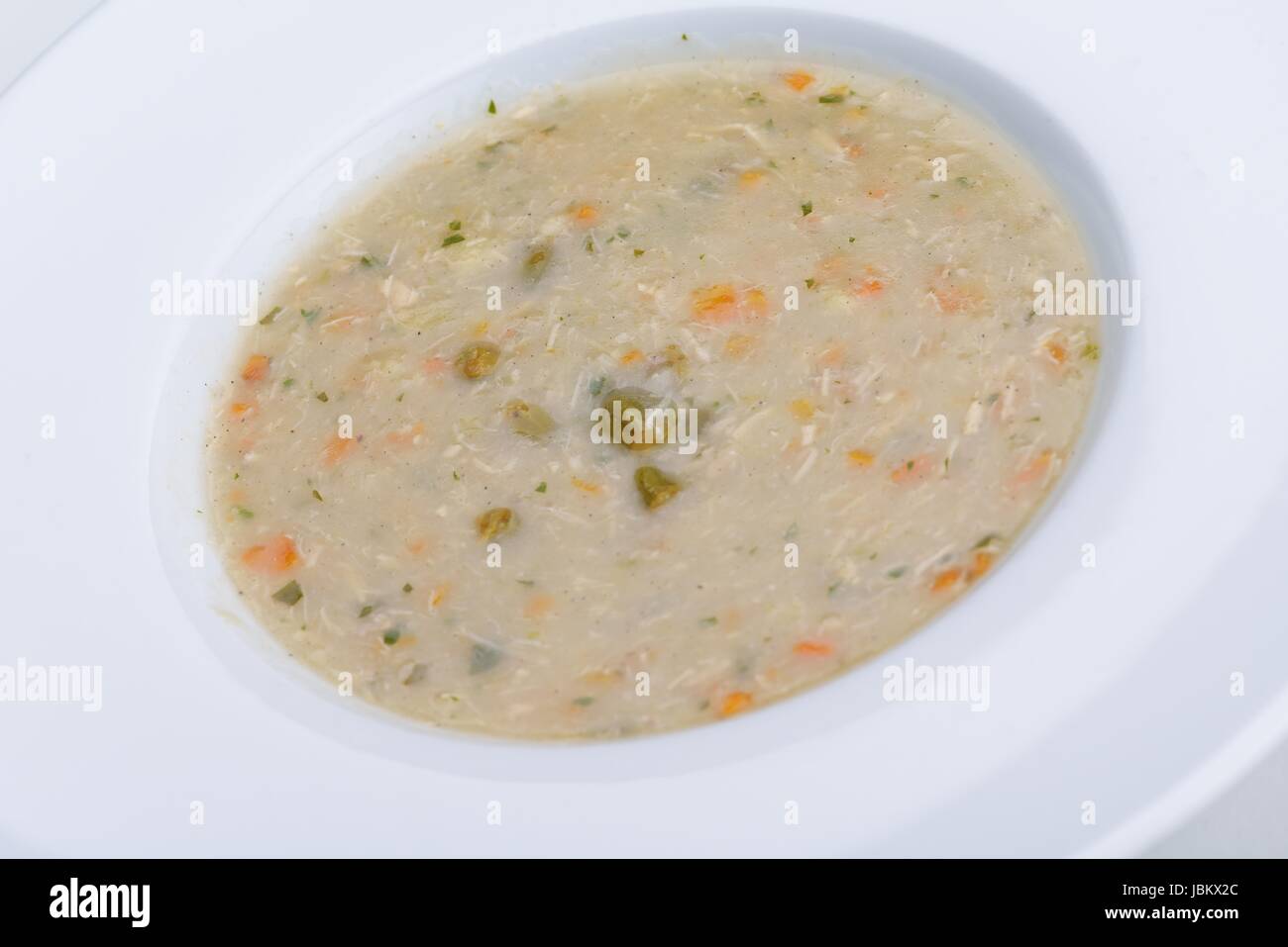 vegetable cream soup closeup isolated on white background Stock Photo ...
