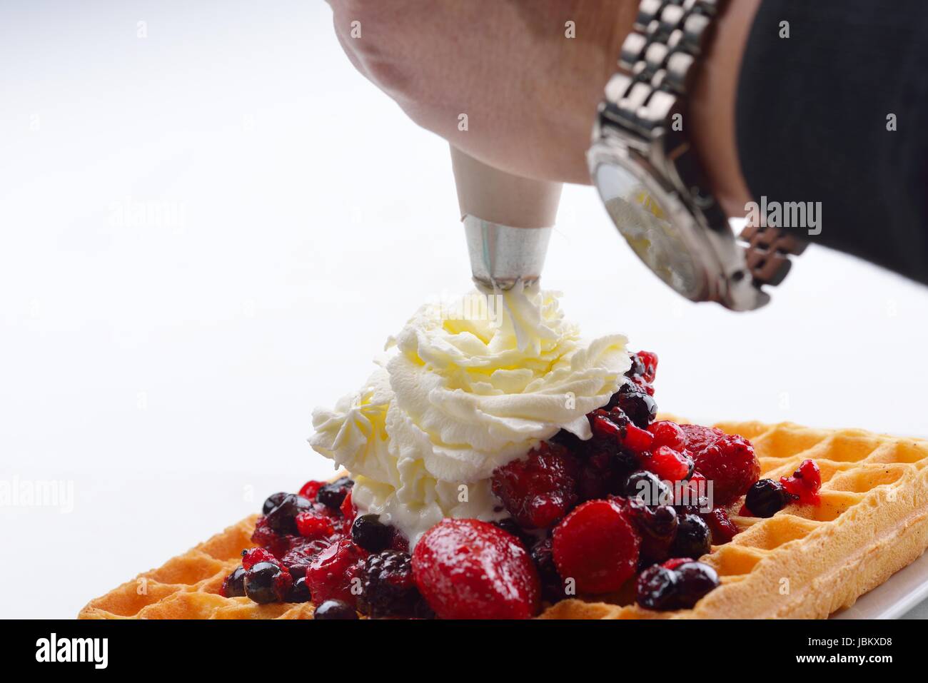 a selection of three italian gelato icecream scoops topped with nuts