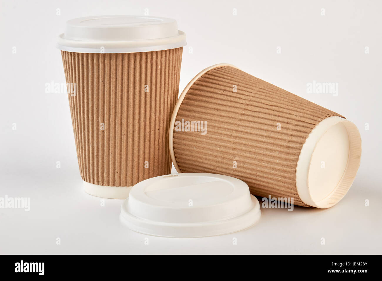 Two paper cups, white background Stock Photo - Alamy