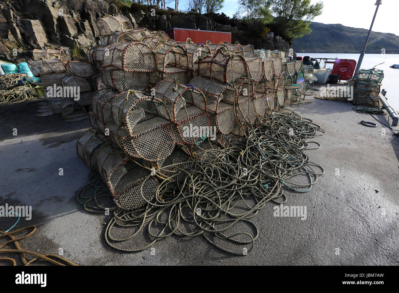 Prawn / Lobster/ Crab creels and ropes Kylesku Fishery Jetty at the harbour in the Scottish Highlands on the shores of Loch Glendhu Scotland on the No Stock Photo