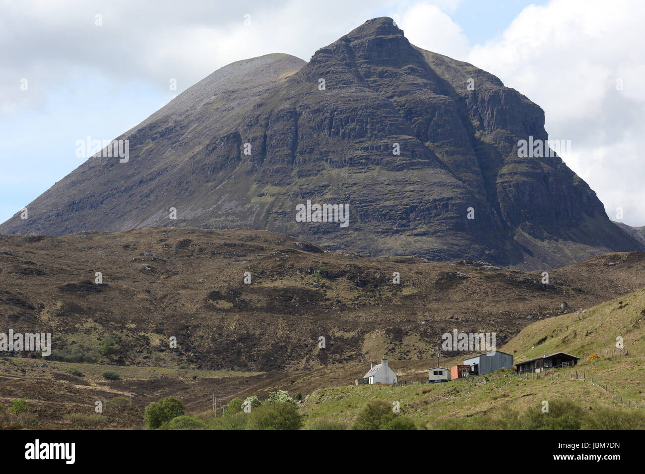 Unapool crofting community near Kylesku in the shadow of Quinag rising to  808 metres in the background on the shores of Loch Glencoul Stock Photo