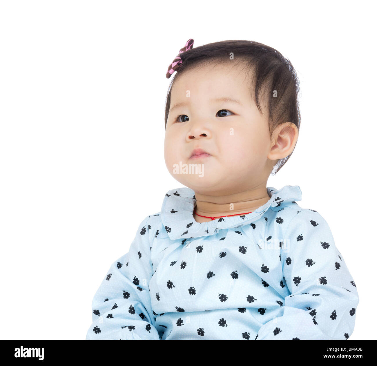 Baby girl looking up Stock Photo - Alamy