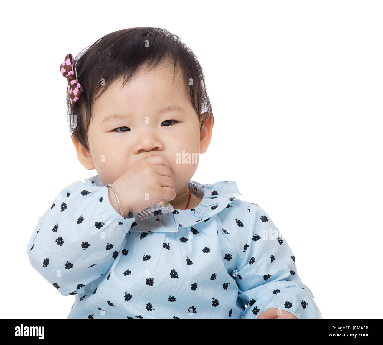 Little girl eating snack Stock Photo Alamy