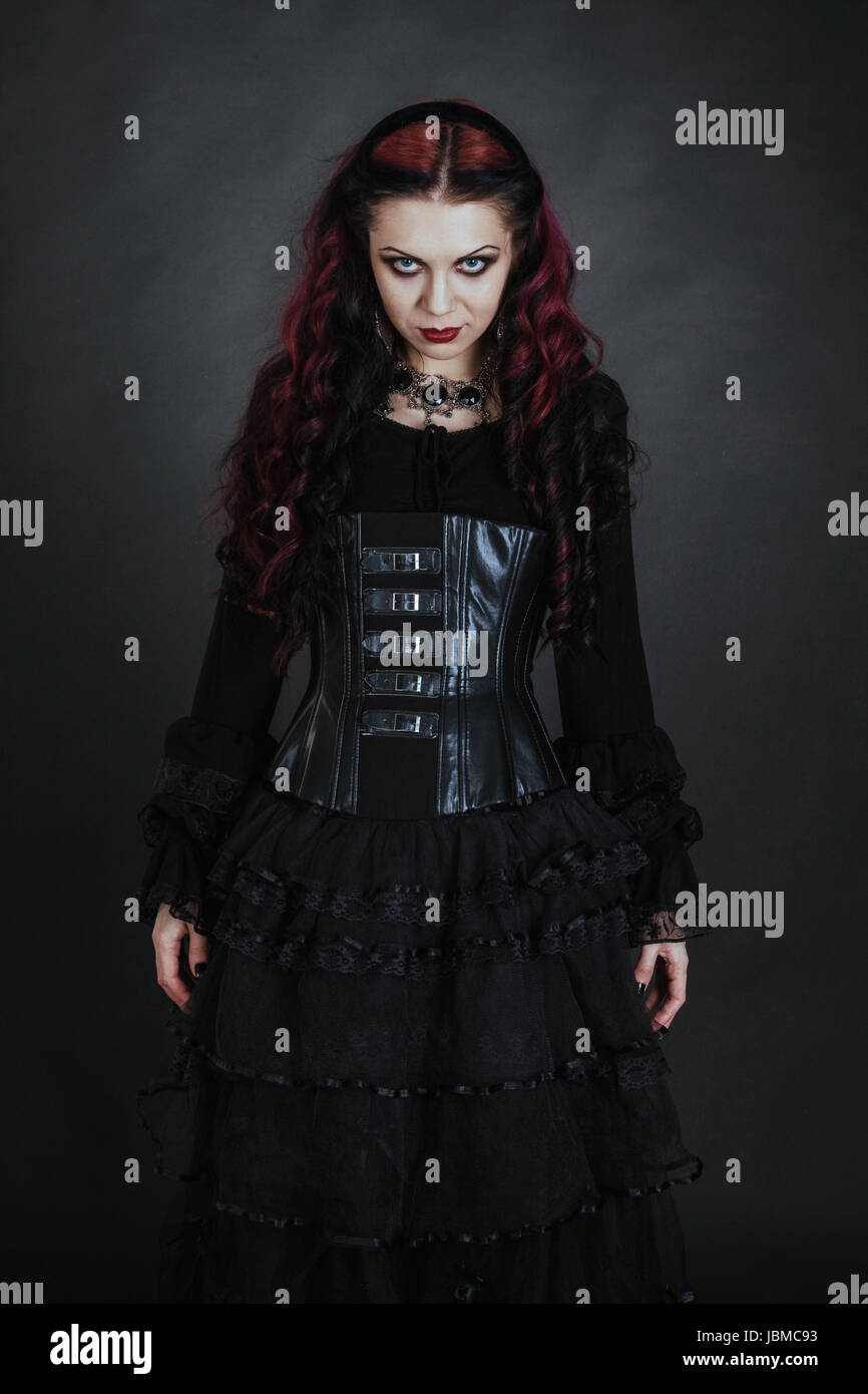 Young goth girl with a red hair Stock Photo - Alamy