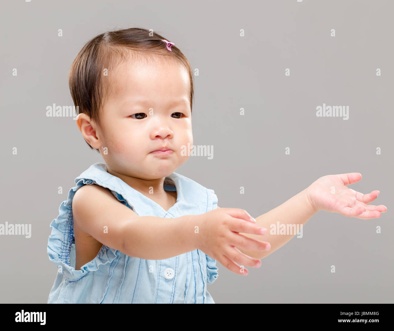 Little girl pulling hand up Stock Photo Alamy