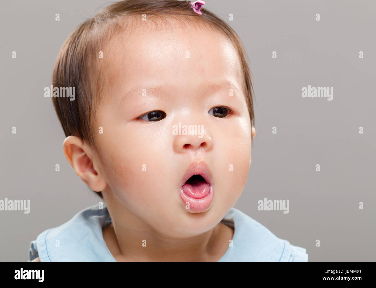 Baby girl coughing Stock Photo Alamy