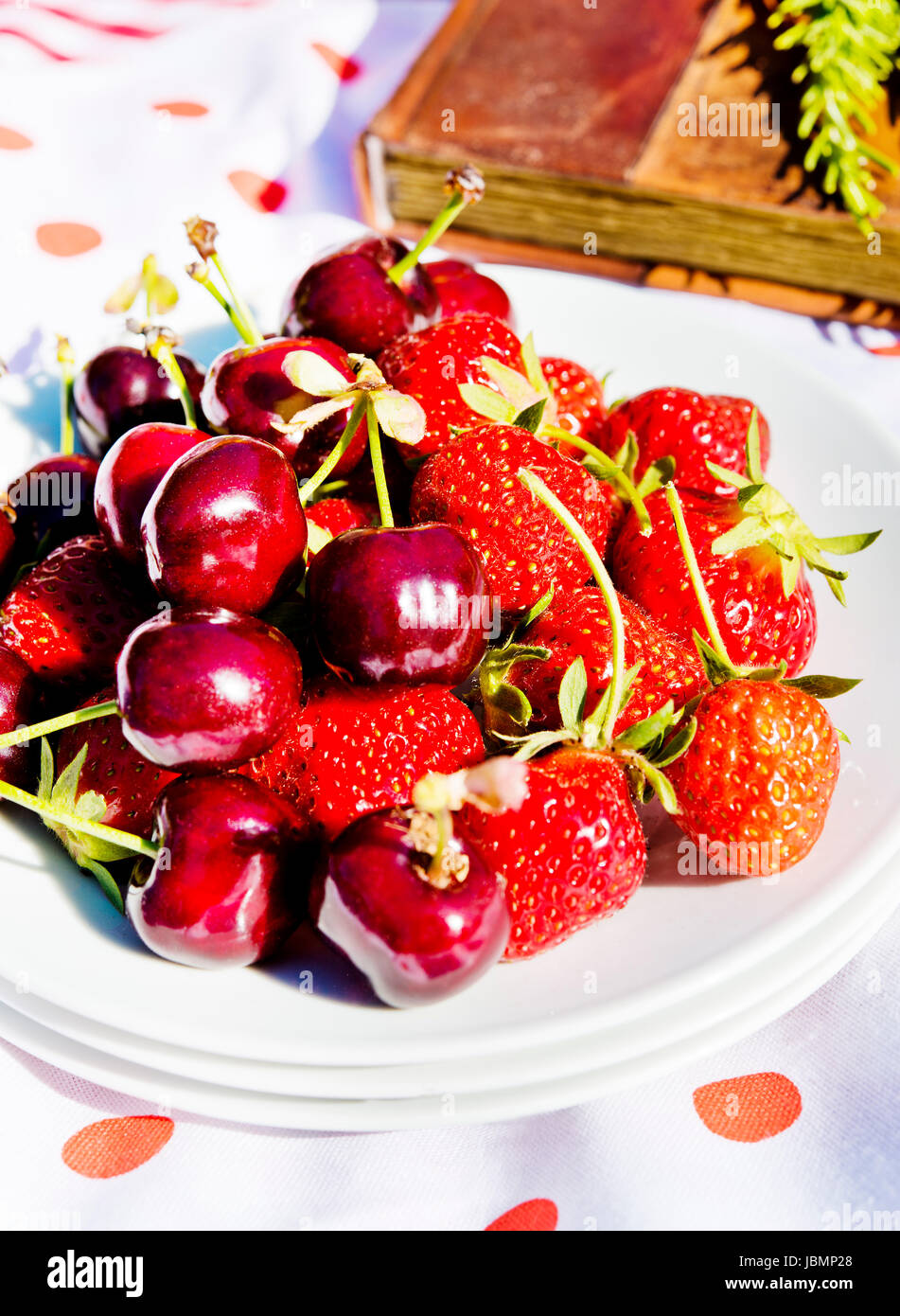 cherries and strawberries from the garden Stock Photo Alamy
