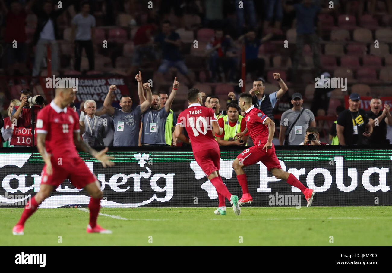 Serbia's Aleksandar Mitrovic (right) celebrates scoring his side's first goal of the game during the 2018 FIFA World Cup Qualifying, Group D match at the Rajko Mitic Stadium, Belgrade. Stock Photo