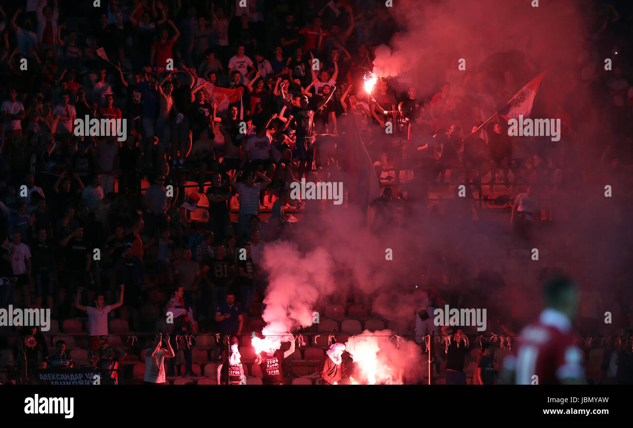 Serbia fans let off flares in the stands during the 2018 FIFA World Cup Qualifying, Group D match at the Rajko Mitic Stadium, Belgrade. Stock Photo