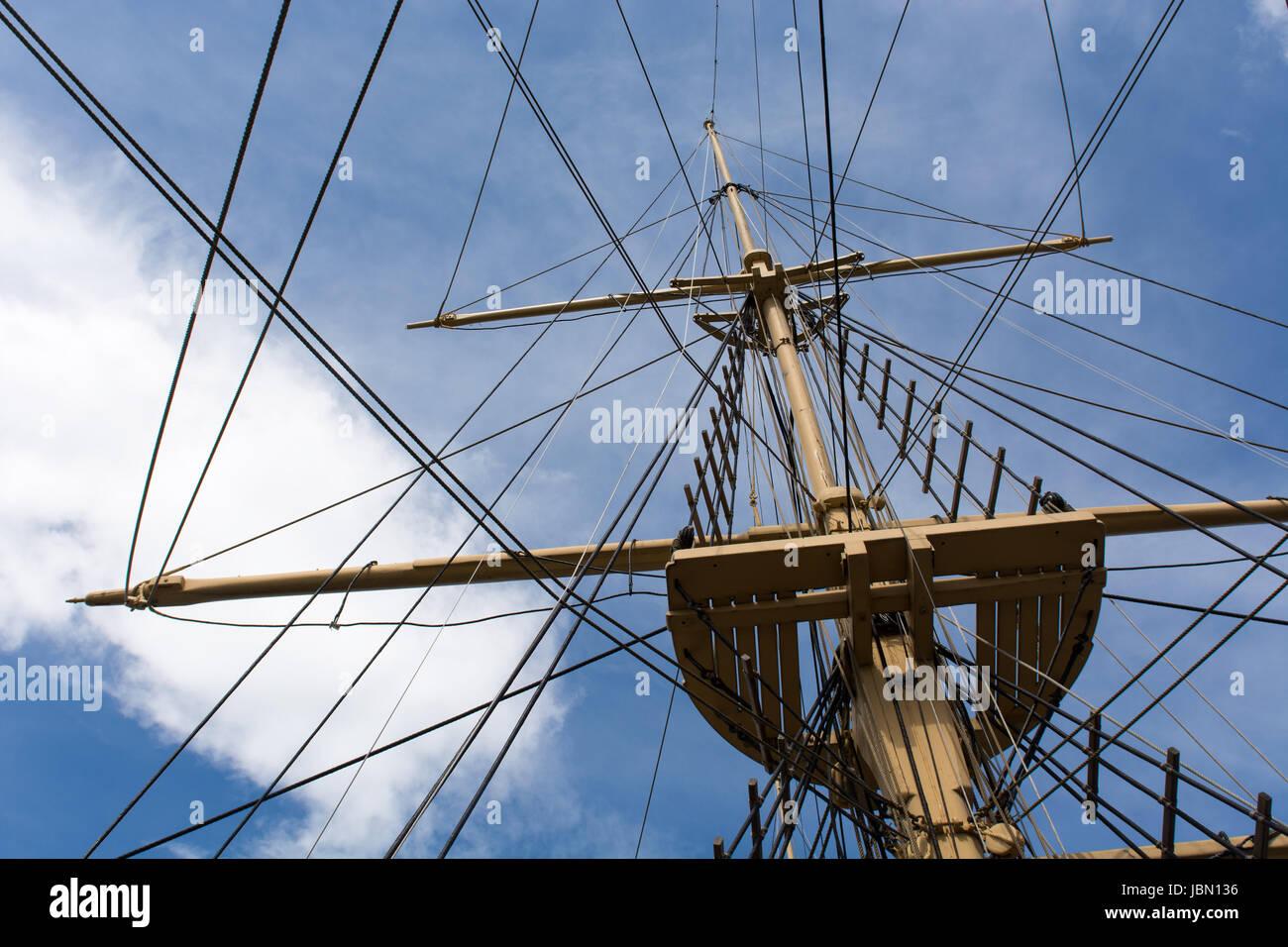 Mast and rigging of a big old sailing ship in front of a blue sky Stock ...