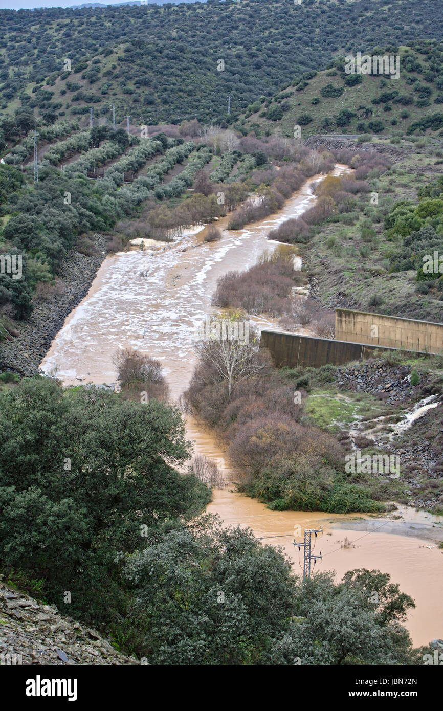 Reservoir Jándula, expelling water after several months of rain, Jaen, Spain Stock Photo