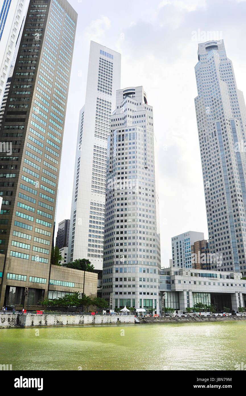 Modern Skyscrapers On A River Bank In Downtown Of Singapore Stock