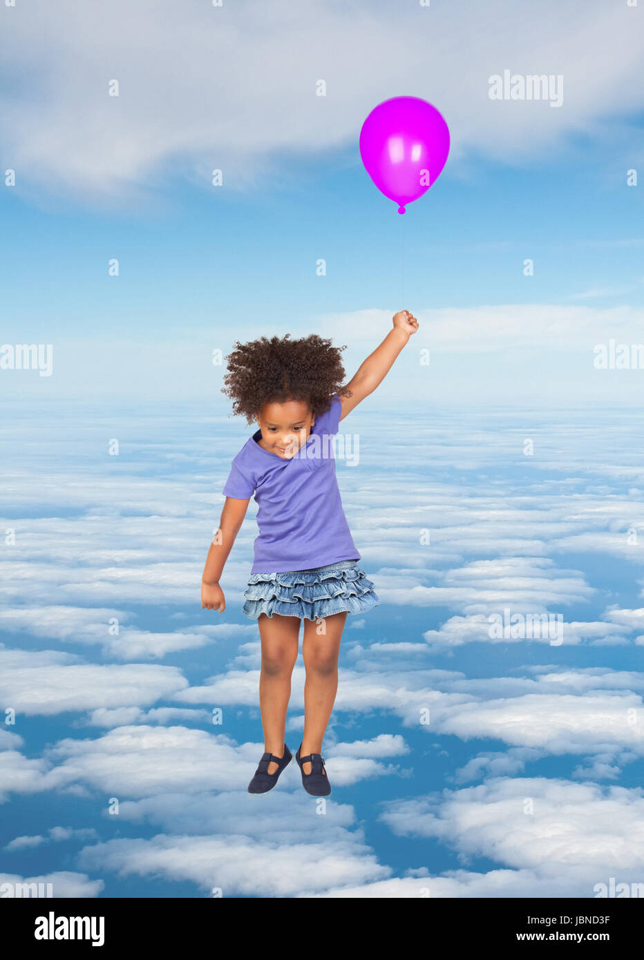 African little girl flying on the sky with a balloon Stock Photo - Alamy